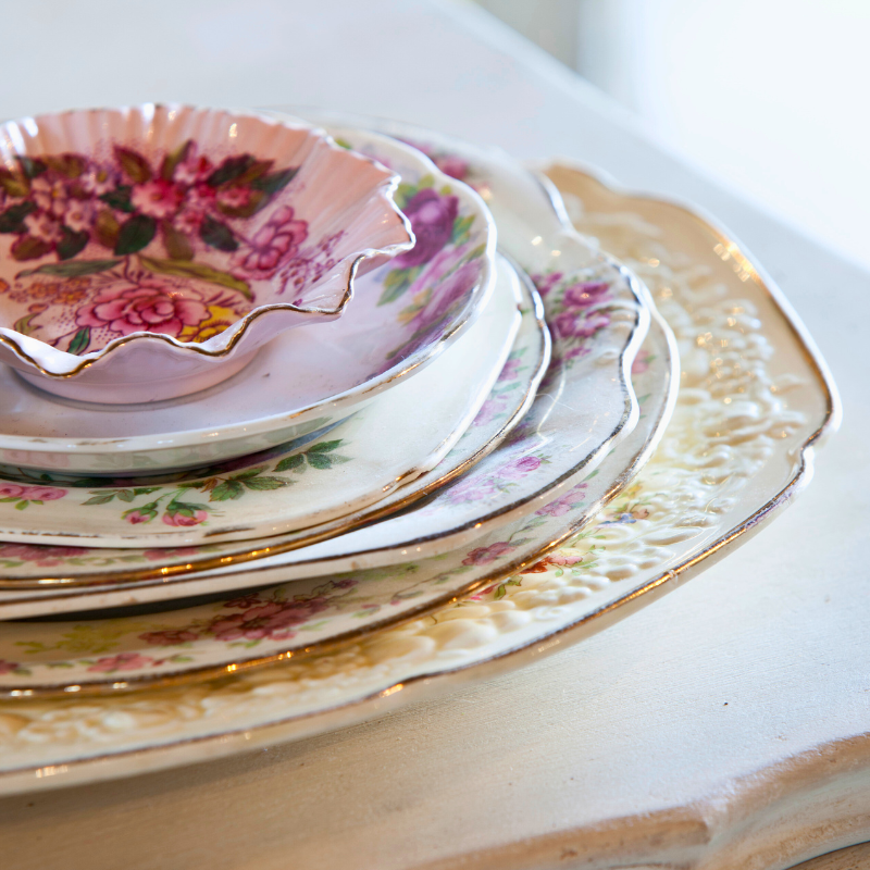 Plates and bowls. Photo of stacked vintage plates