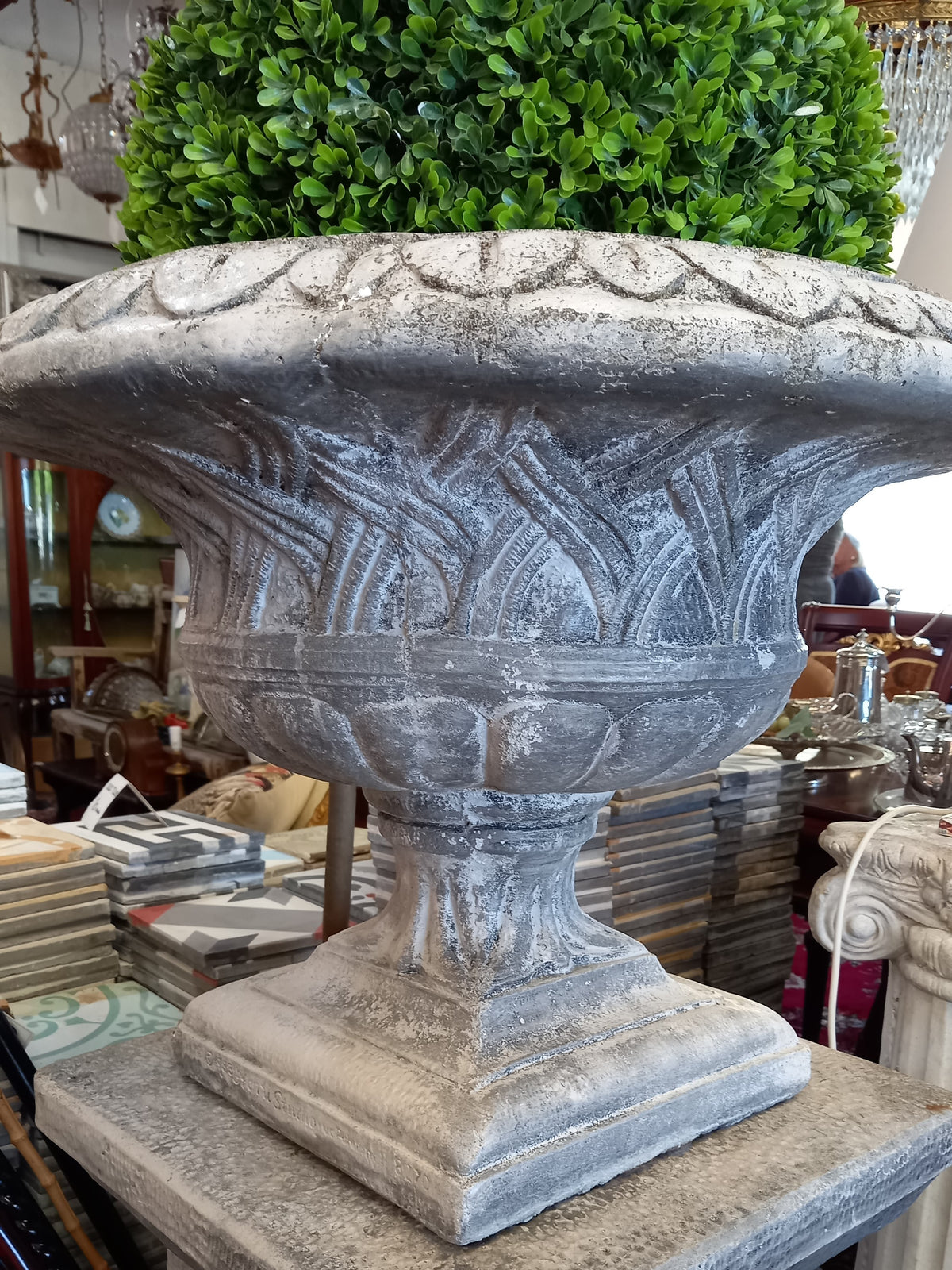 Pair of Urns on Plinths