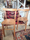 Two wooden childrens school chairs circa 1910