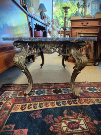 Marble Top Coffee Table, image showing the base from the side view.