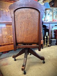 American antique oak swivel office chair back view