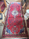 Persian hallway rug in reds, blues and cream