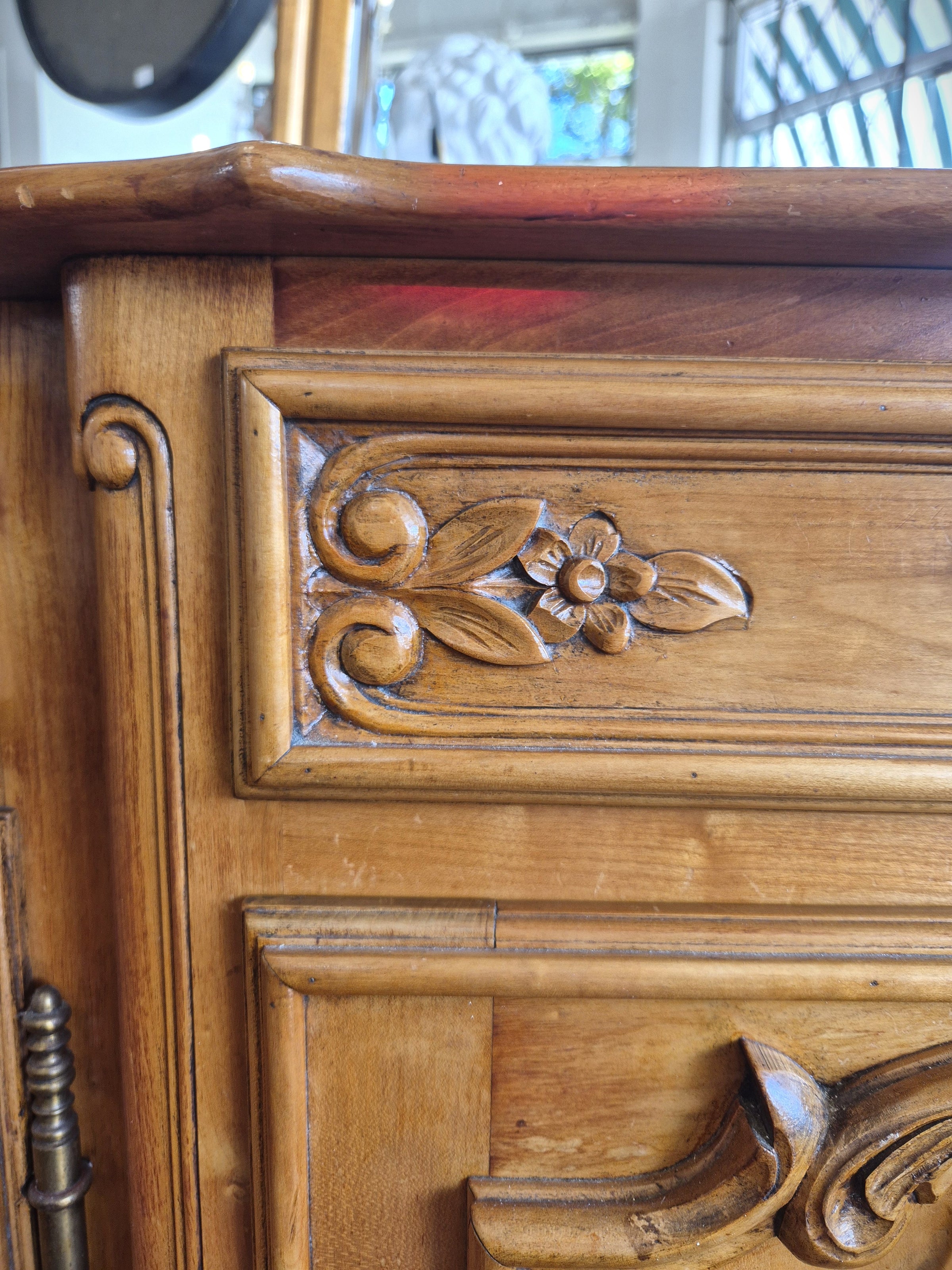 Vintage European Beech Reproduction Sideboard showing close up of carved detailing. 