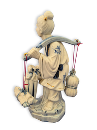 Vintage chinese fisherwoman figurine back view